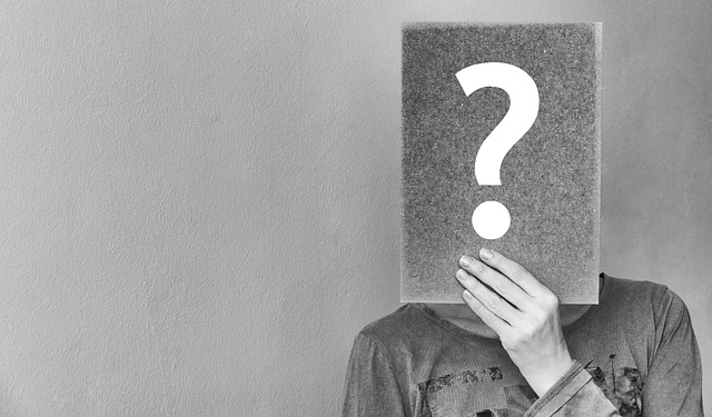 A person thinking about opinion statements and five factual statements