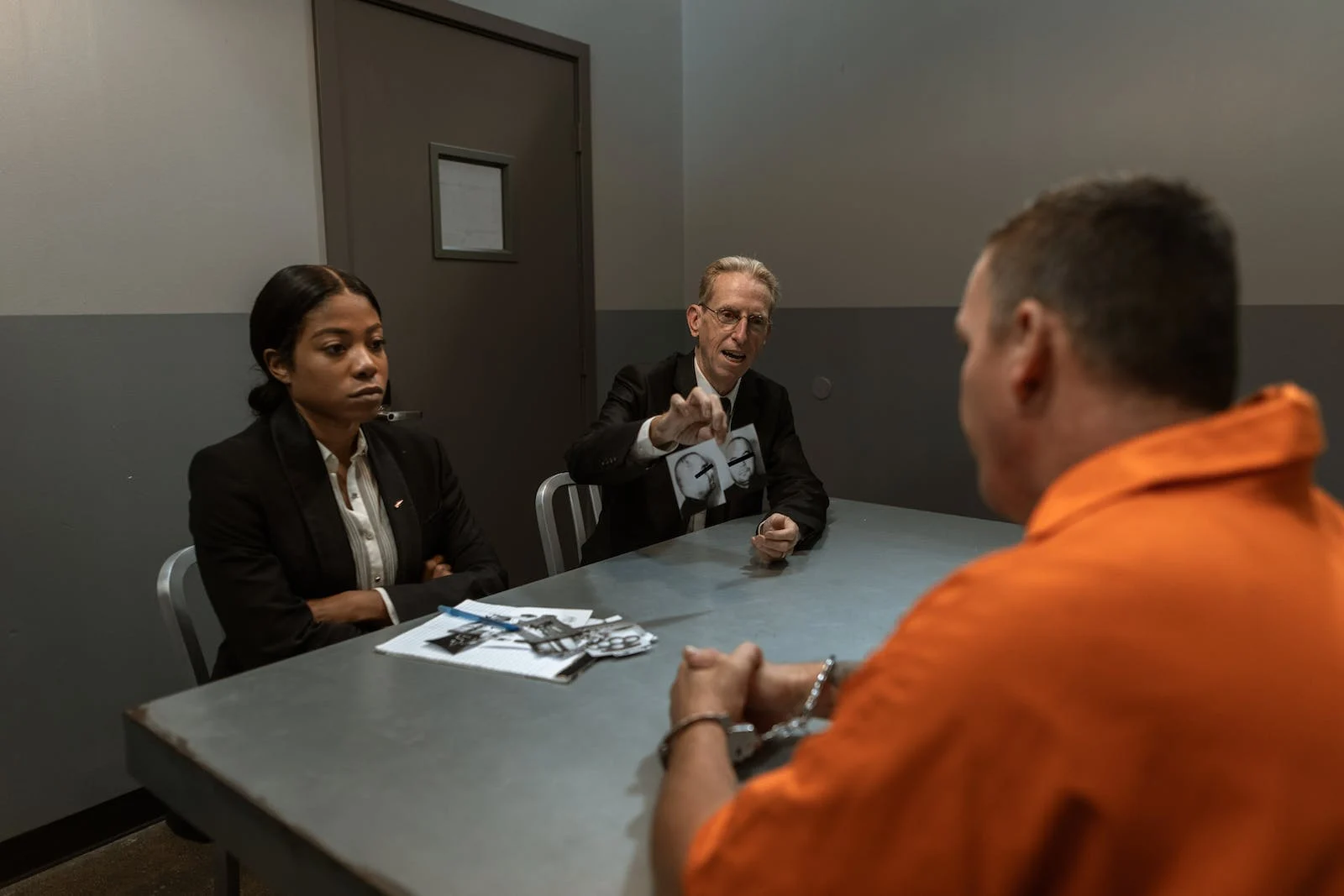 A police officer interviewing a suspect in a criminal investigation