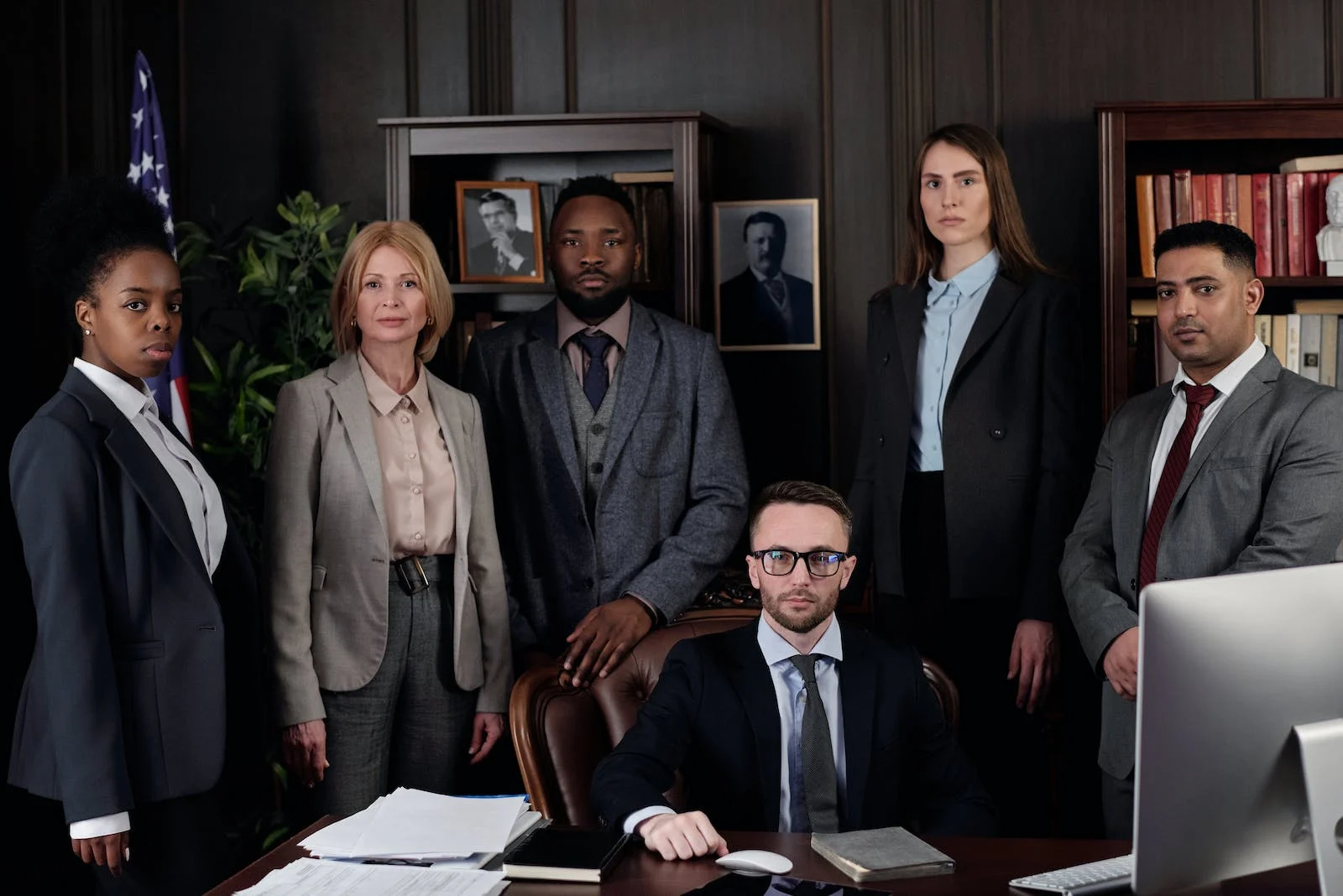 A group of people in suits, representing the Authorities