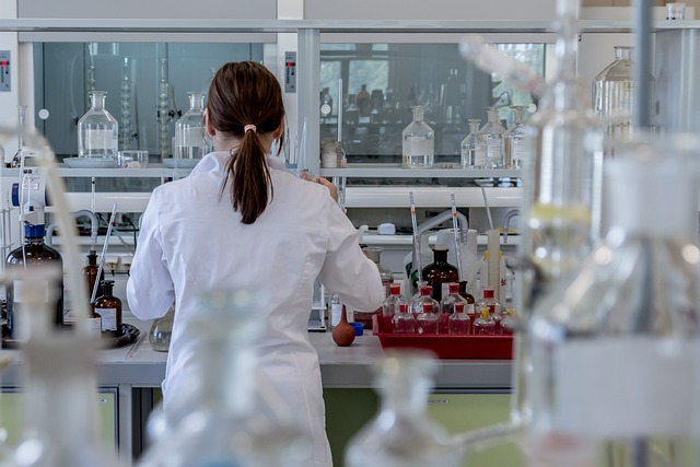 A forensic scientist examining physical evidence in a laboratory